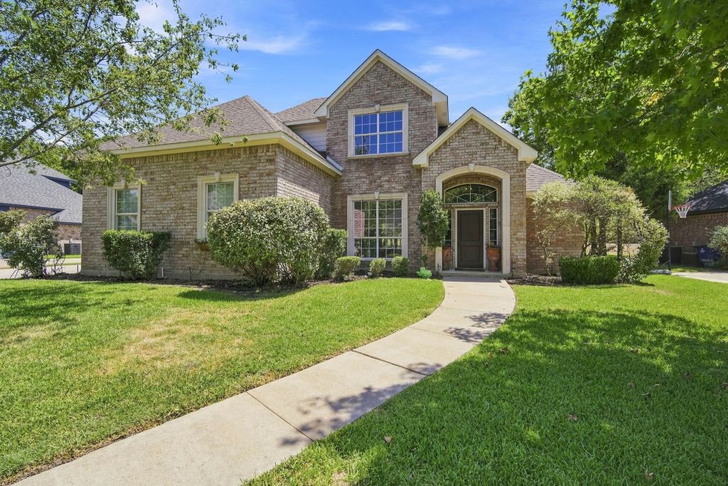 1207 Oak Creek Drive, Ennis, TX 75119 — photo 1